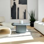 Bright, airy, and modern living room with sunlight streaming through the windows, representing a comfortable and energy-ef...